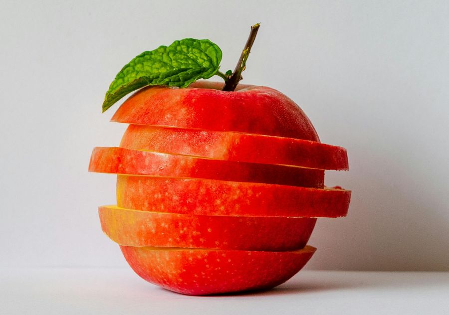 image of an apple cut and put together