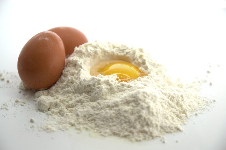 illustrative image of flour with eggs