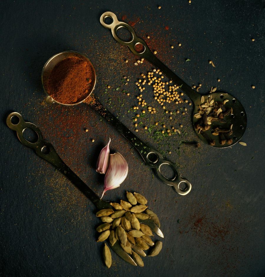 assorted spices on spoons