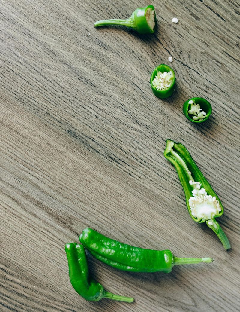 cut jalapeno peppers showing seeds